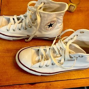 White high top All Star Converse.